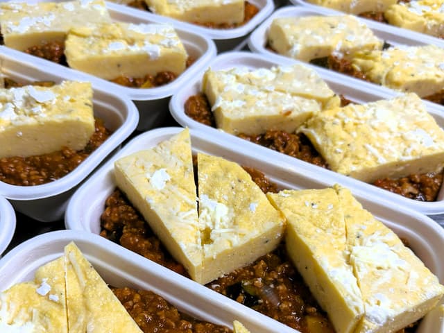 Pork & vegetable ragu w/ rosemary w/ cheesy polenta~ Frozen