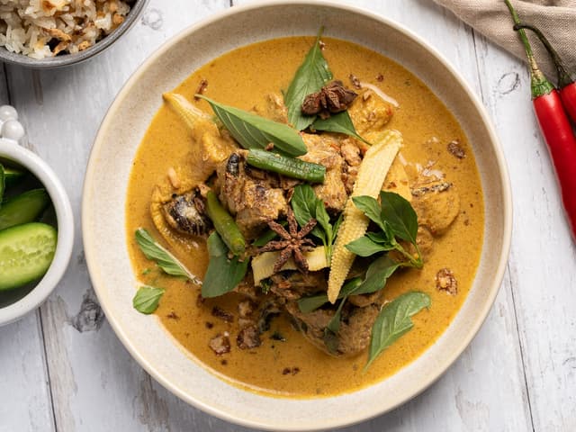Southern Thai curry of free-range pork, snake beans, star anise and baby corn