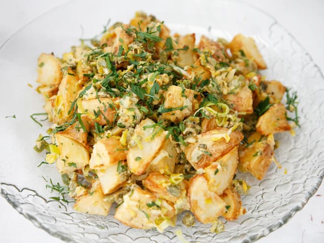 Warm potato salad with leek and smokey dressing