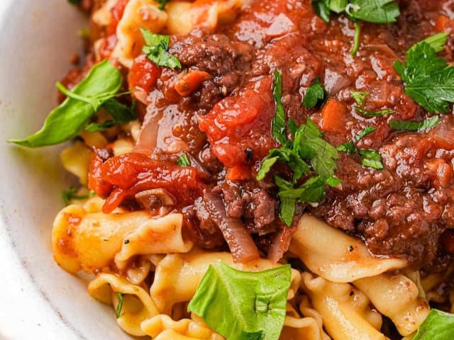 Vegan Bolognese Sauce with Vegan Penne and Cashew Parmesan
