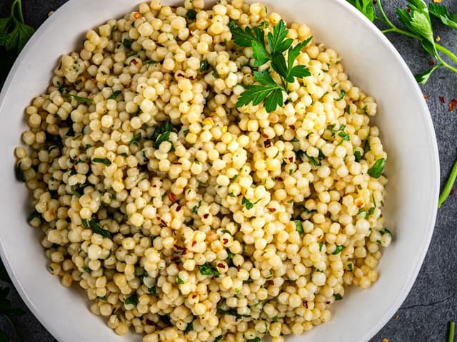 Herby Pearl Cous Cous with Apricot, Currants & Toasted Almonds