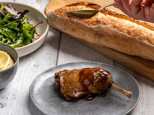 Duck confit with star anise and orange spiced jus