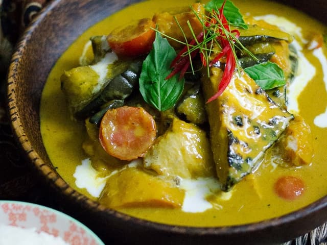 Yellow curry of grilled tofu, butternut, shitake, snake beans and holy basil