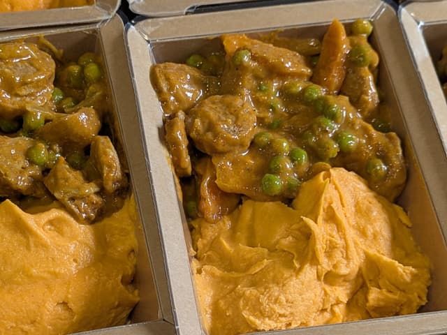 Curried Sausages with Sweet Potato Mash