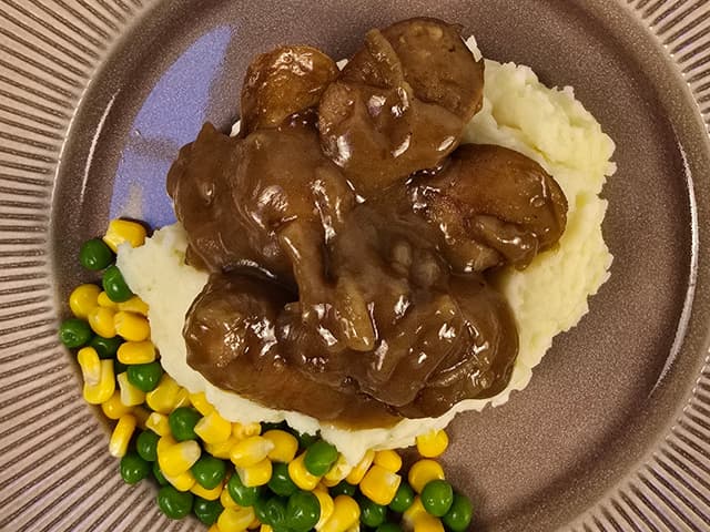 Beef Sausages, Peas, Corn & Mash