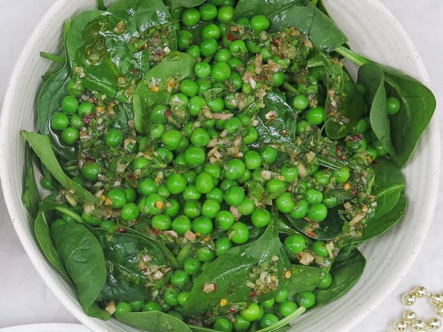 Green salad with peas and herb salsa