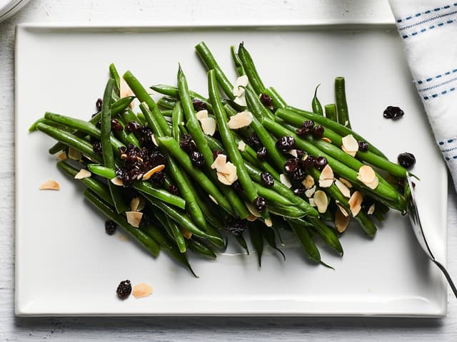 spring greens, macadamia, yuzu & soy dressing