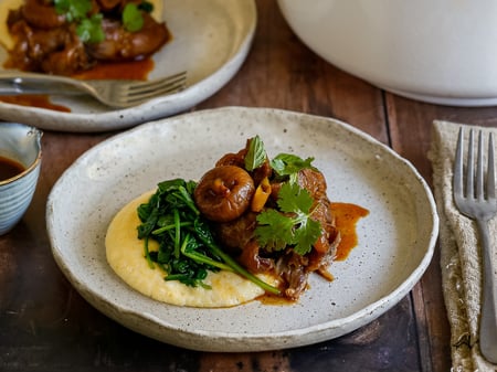 Braised lamb shanks with figs & oriental spices, soft polenta