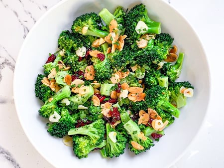 Charred Broccoli, Grilled Chicken w/ Almonds, Cranberries and Ran ch Dressing