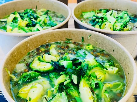 Spring green vegetable soup with french lentils and pesto