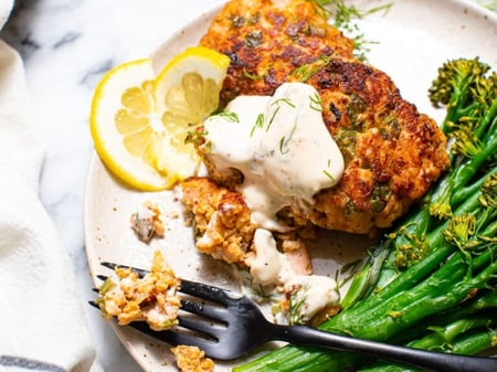 Salmon Patties with Dill Sauce and Steamed Broccolini