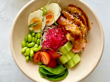 Teriyaki chicken poke bowl, soba noodles, edamame beans, miso ginger dressing