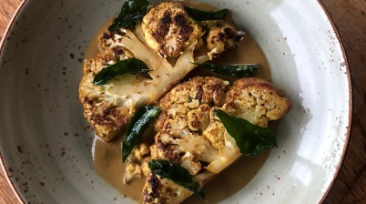 Garam Masala spiced Roasted Cauliflower with cashew and coconut sauce