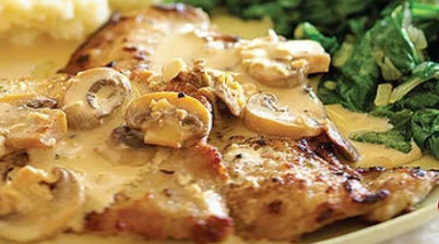 Veal Scaloppine in wine, cream and sage served with Rice Pilaf