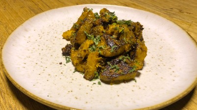 Pumpkin cooked in mustard oil and fenugreek seeds 