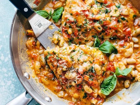 Barramundi with a Garlic and Basil White Bean, Tomato and Butter Ragu