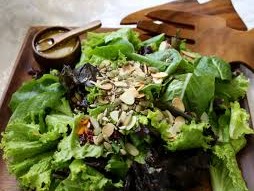 Green Salad with green goddess dressing & crispy seeds