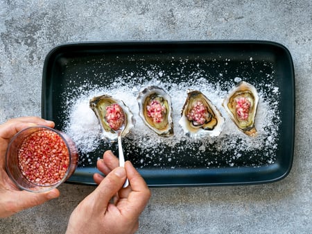 Freshly shucked oysters with red wine mignonette