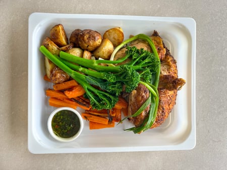 Peri-Peri chicken roast, potatoes, carrots, broccolini, Chimichurri