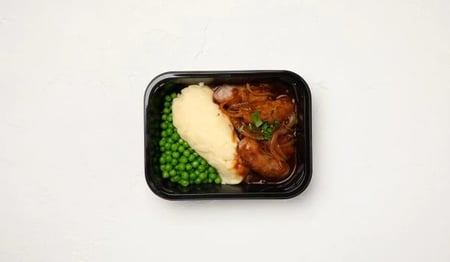 Beef Sausages with a Tomato and Onion Confit On Mash & Peas