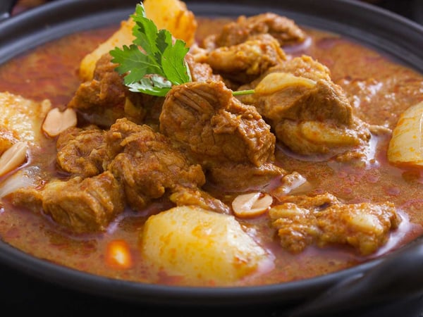 Beef Massaman Curry with Rice and vegetables