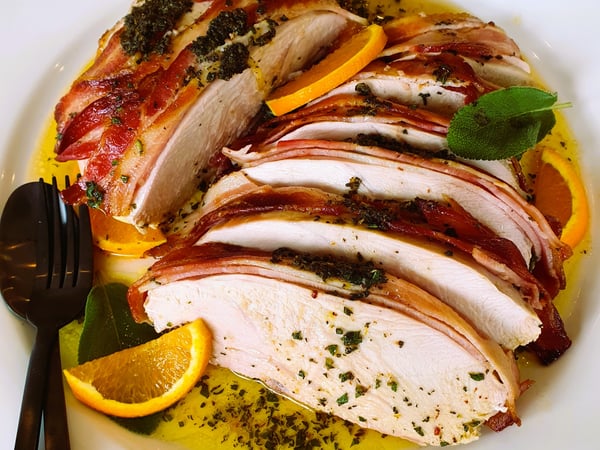 ROASTED TURKEY BREAST WRAPPED IN LOCAL BACON