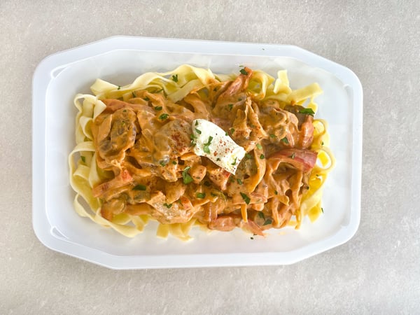 Beef stroganoff with mushrooms, parsley and Fettucini