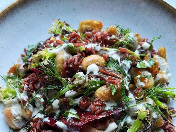 Roasted cauliflower salad red rice, herbs and dates and a tahini lemon dressing