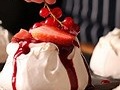 Large Raspberry and Cocoa Meringue with Cream Chantilly and Berries