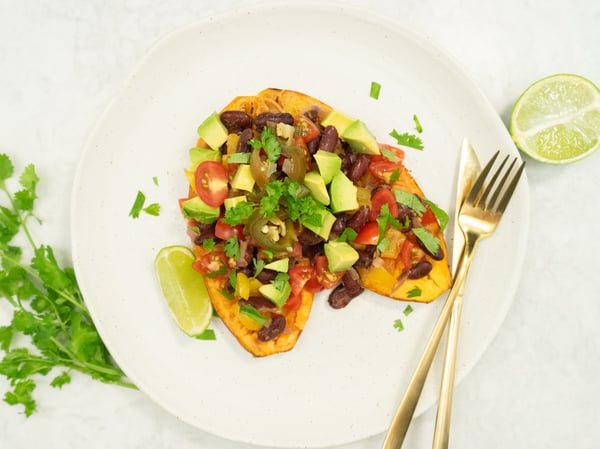 Loaded sweet potato with beans and fresh salsa