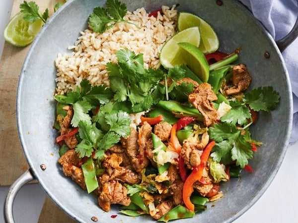 Ginger Pork stir-fry with snow peas, cabbage and almonds