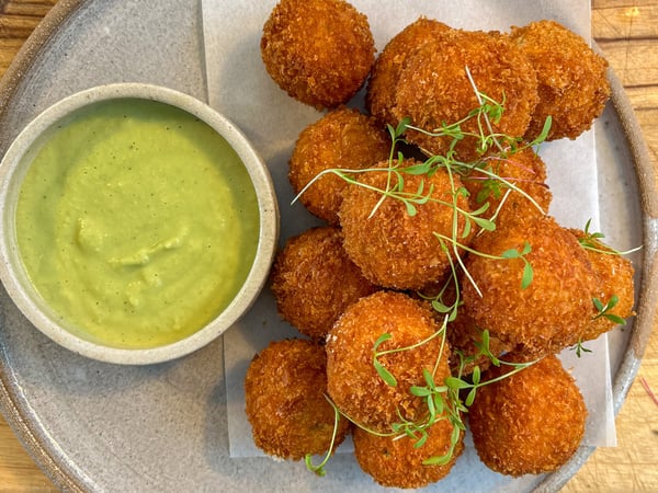 Roasted pumpkin, spinach & parmesan arancini with pesto basil dip