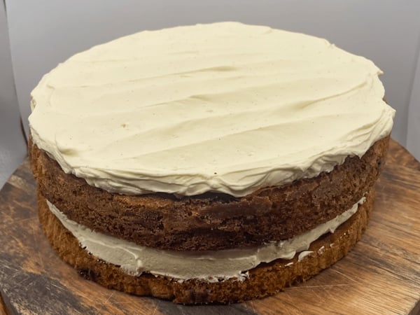 Double layer blueberry and sour cream cake, vanilla mascarpone frosting