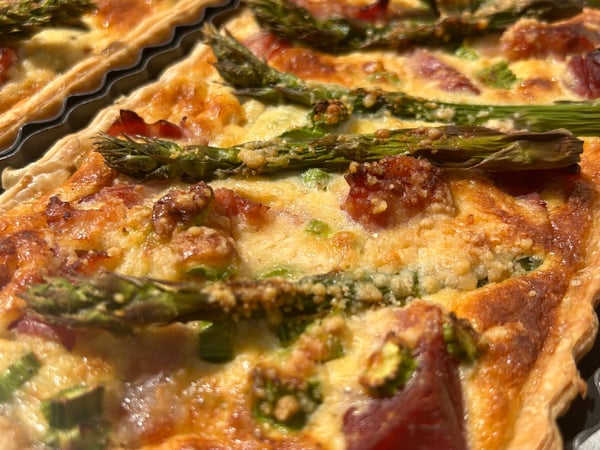 Ham and asparagus tart with pumpkin and spinach salad