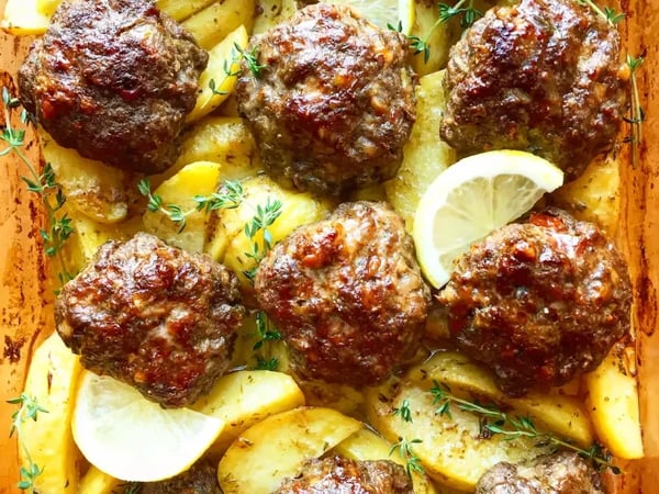 Greek Lamb Meatballs stuffed with Feta and Lemon Potatoes