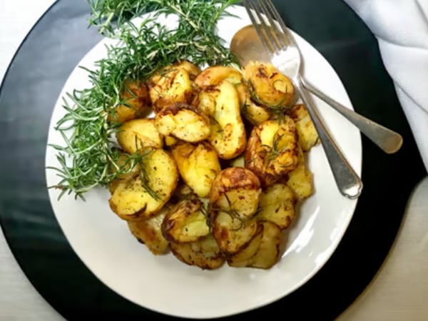 Tray of Duck Fat Roasted Potatoes with Rosemary and Garlic