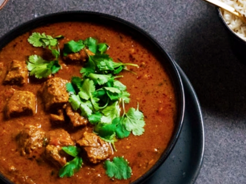 Lamb Vindaloo w/ Rice and Vegetables