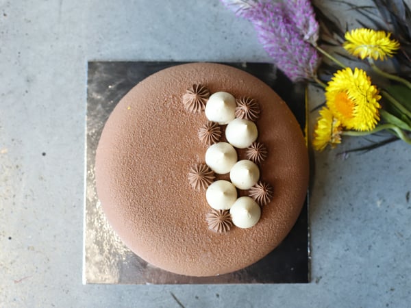 Peanut butter mousse with chewy caramel celebration cake