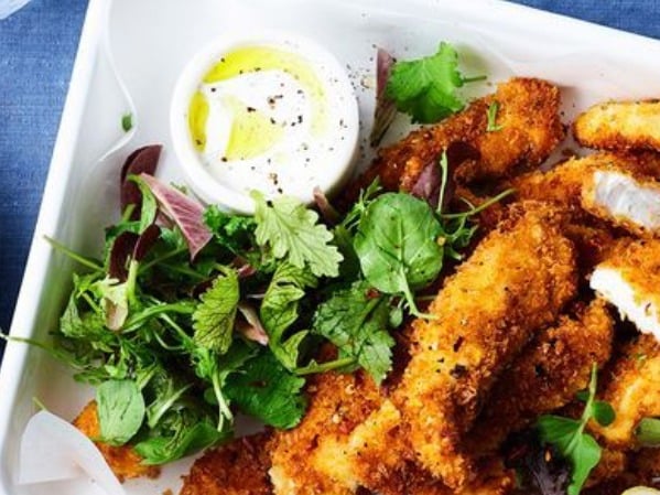 Fish fingers with braised peas and lettuce and mashed potato