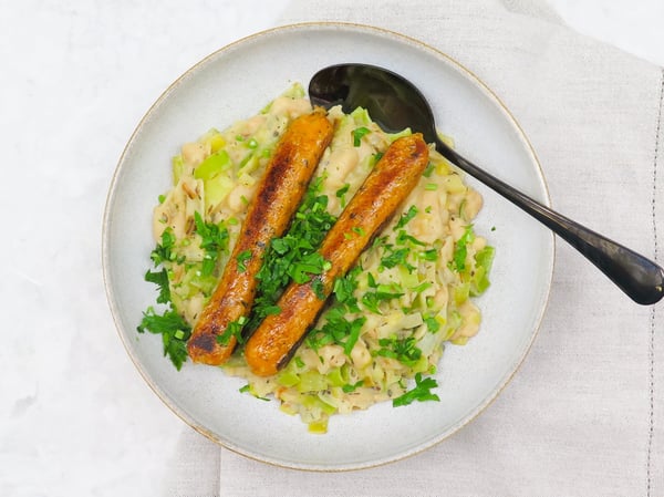 Creamy white bean and leek cassoulet with Syndian sausages