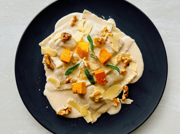 Pumpkin and sage raviolis with walnut cream sauce