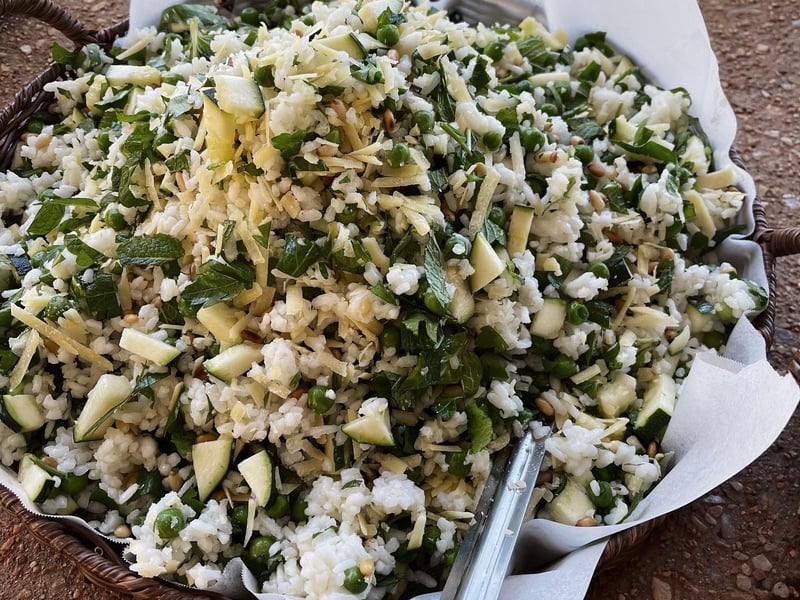 Rice salad with peas, mint, zucchini, lemon and pine nuts