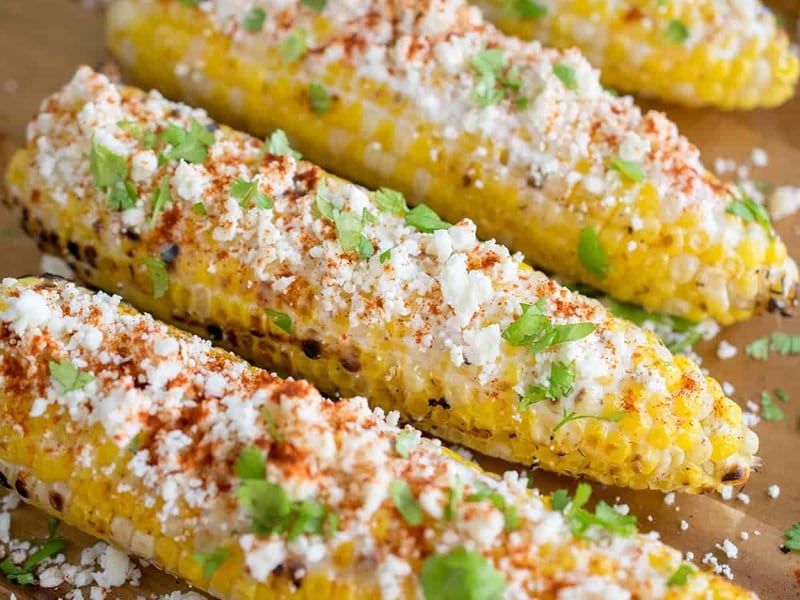 Sweet corn with chipotle butter lime and manchego cheese