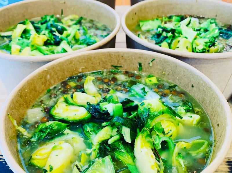 Spring green vegetable soup with french lentils and pesto