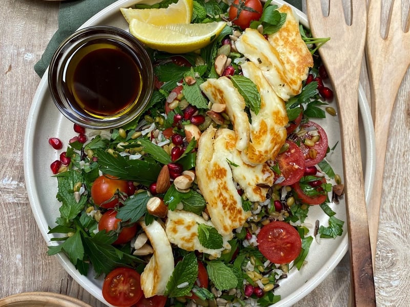 Grain Salad with Pomegranate, Fig, Wild Greens, Orange & Halloumi