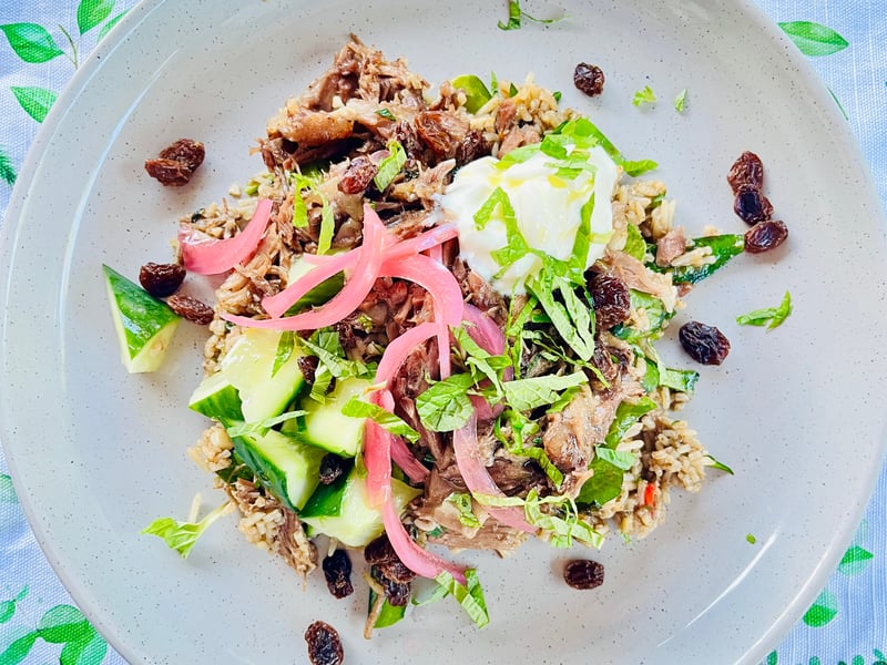 Lamb Pilaf w/ raisins, pickled onion & cucumber