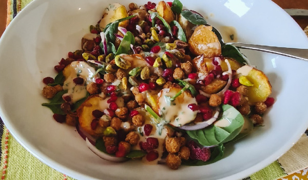 Roasted Potatoes with Chickpeas, Pomegranate & a Minty Yoghurt Dressing (V, VE*)