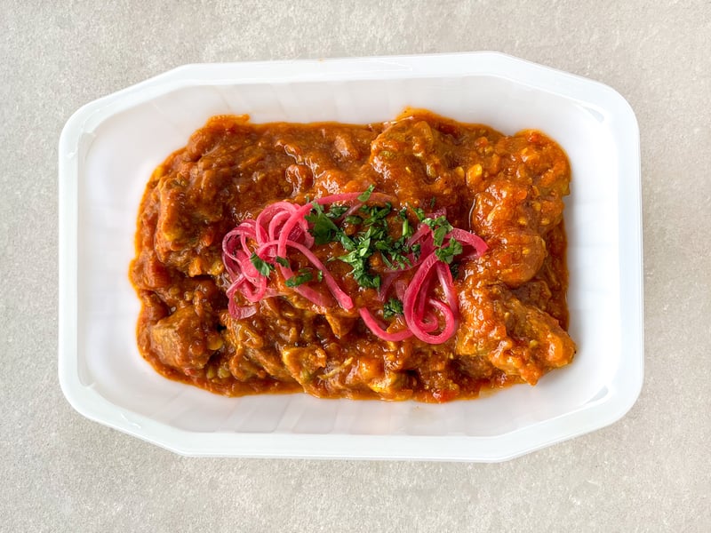 Pork vindaloo with picked Onions