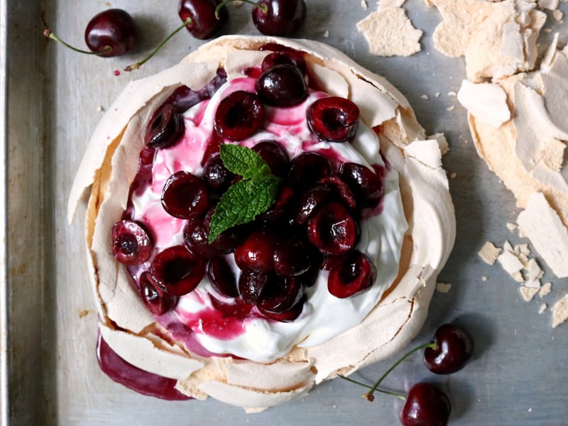 Lemon Myrtle Pavlova with fresh cherries and  Wattleseed